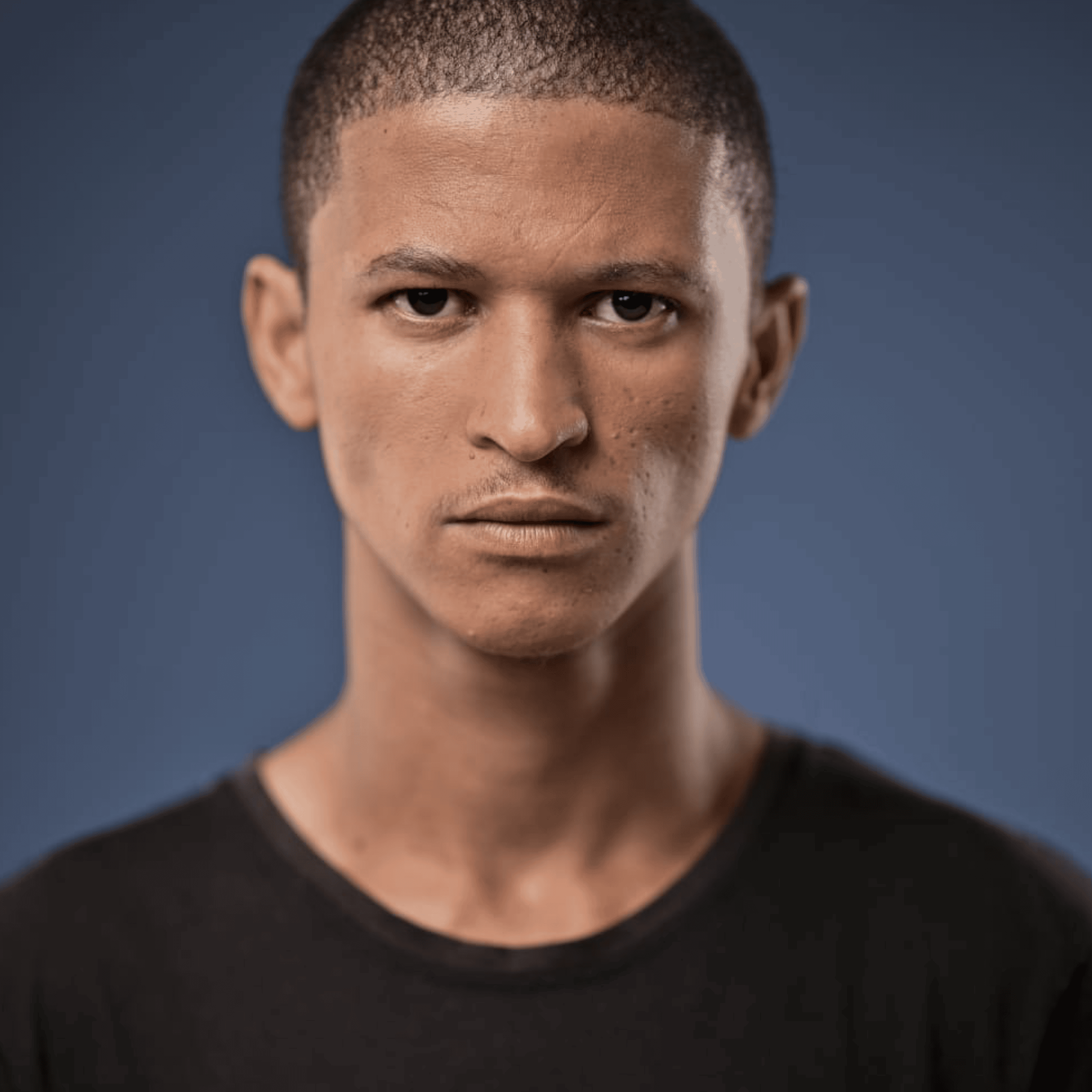 young man getting his hair coloured